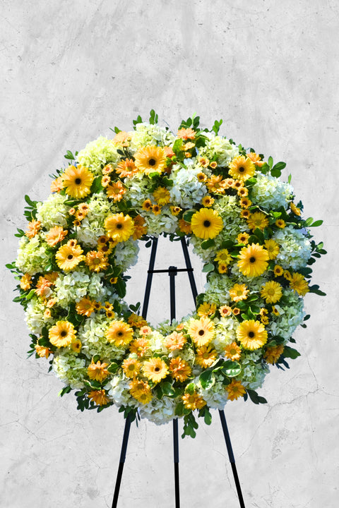 Corona Circular de Condolencias de Margaritas y Gerberas Amarillas – corona fúnebre para funeral en Lima